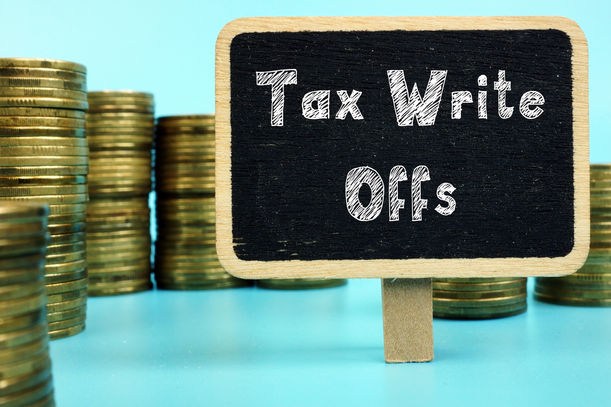 Conceptual photo about Tax Write-Off with handwritten phrase.